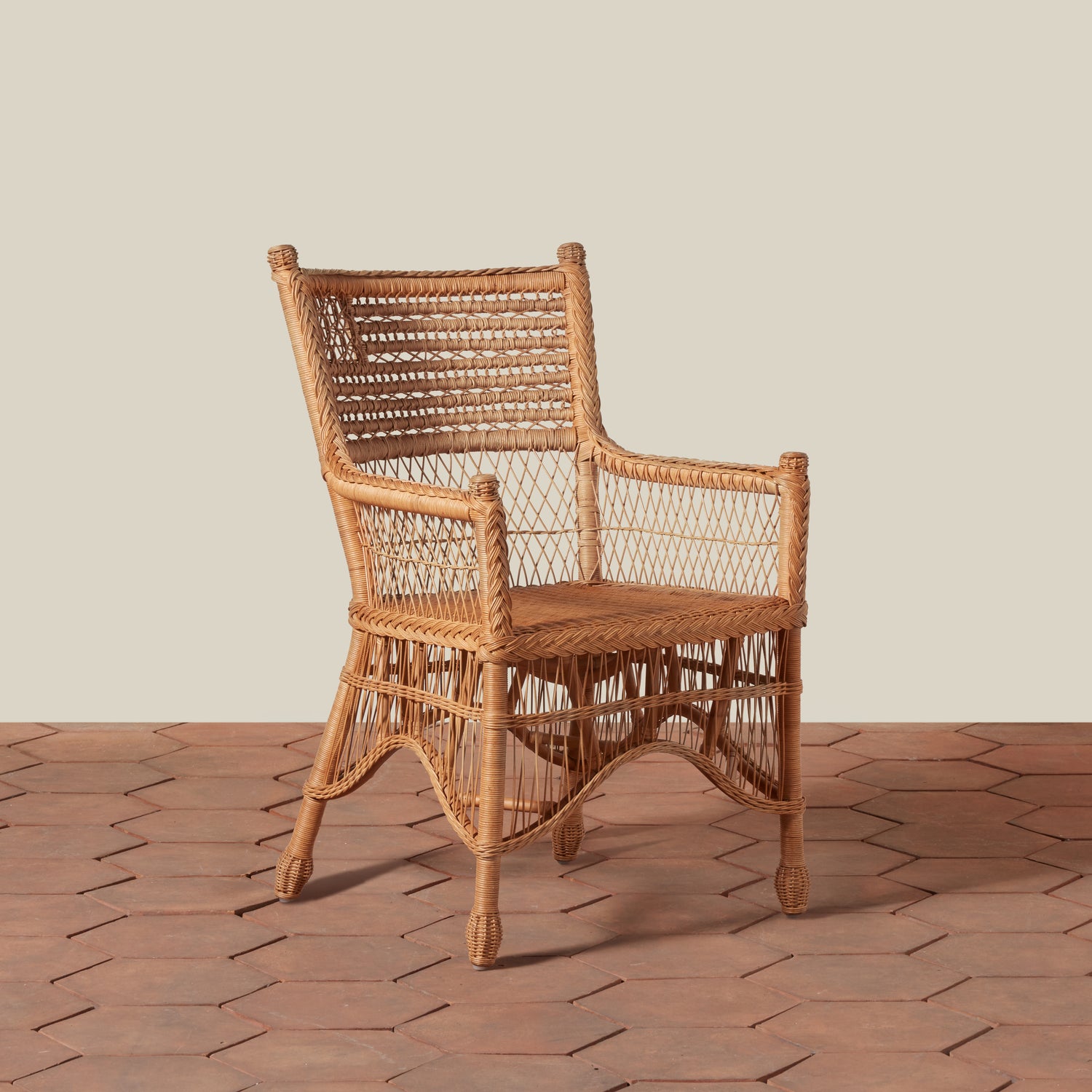 Wicker armchair on a wooden floor with a neutral background- Number 1