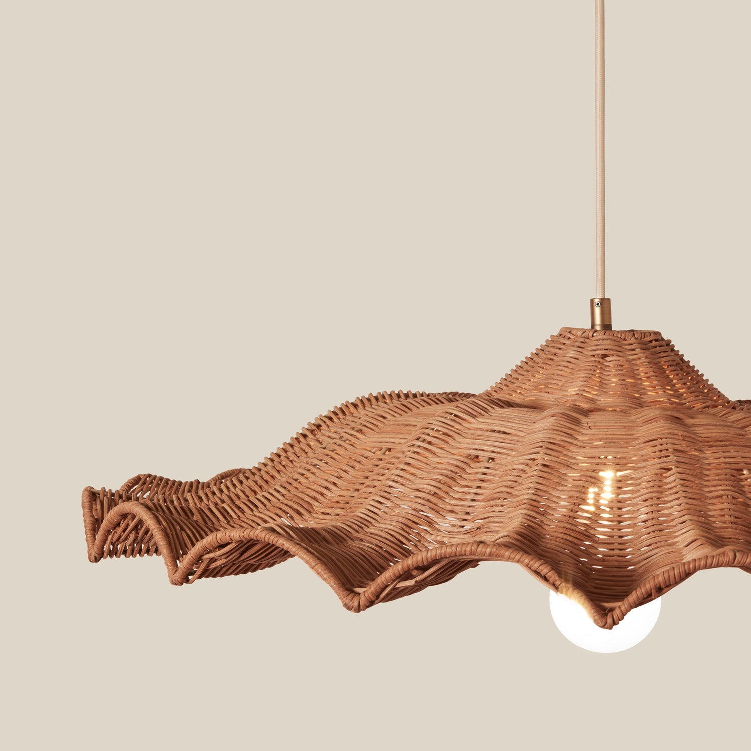Woven rattan pendant light on a beige background- Number 4