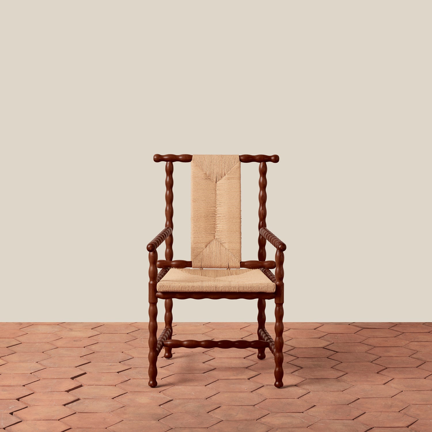 Wooden chair with beige cushion on a wooden floor and beige wall- Number 6