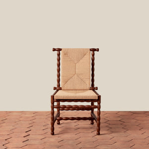 Wooden chair with a woven backrest and cushion on a wooden floor. - Number 4
