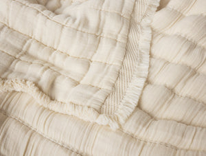 Close-up of textured beige fabric with a focus on pattern and texture. - Number 2