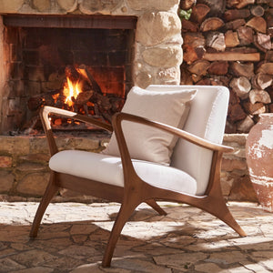 soren ventura outdoor lounge chair by fireplace