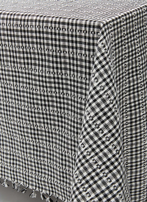 black and white tablecloth on corner of table - Number 6