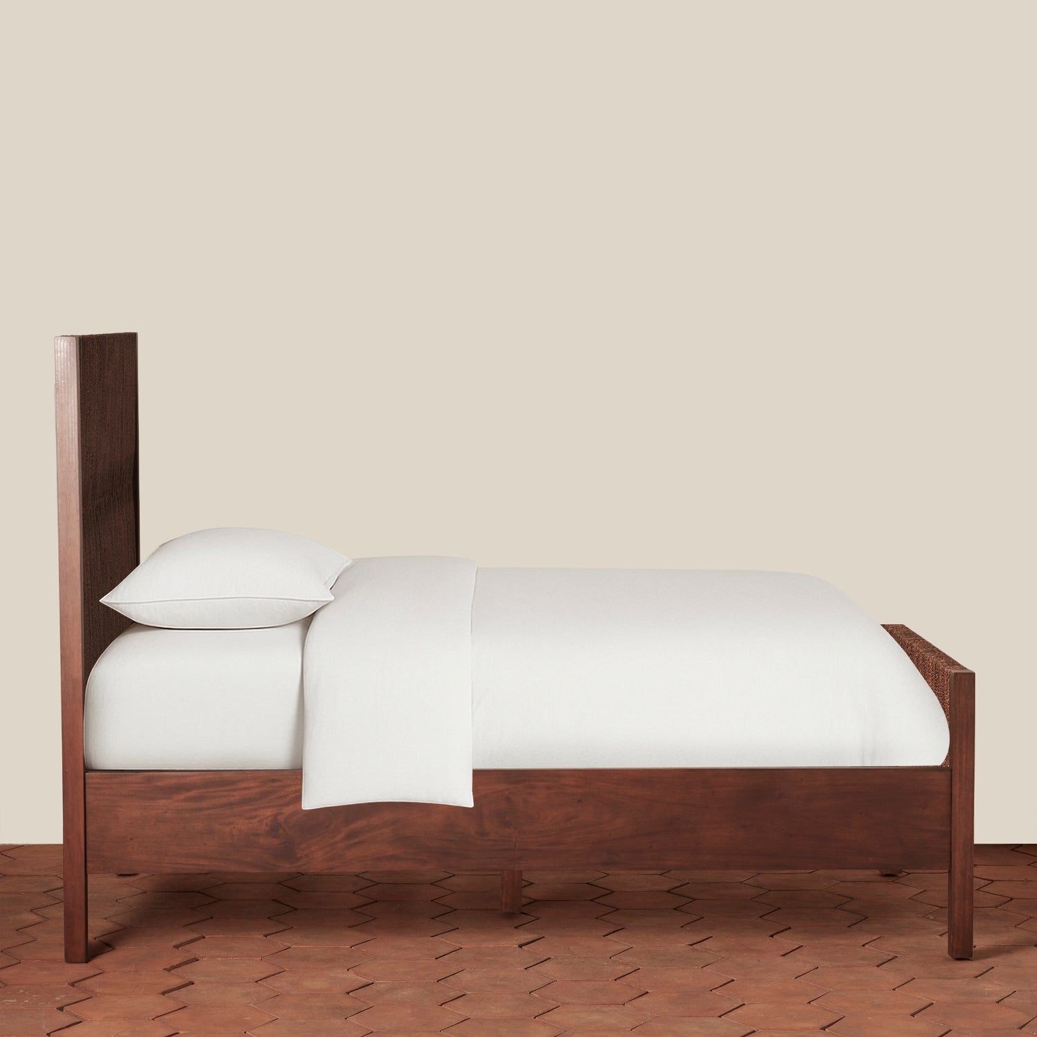 Wooden bed with white bedding on a beige background- Number 7