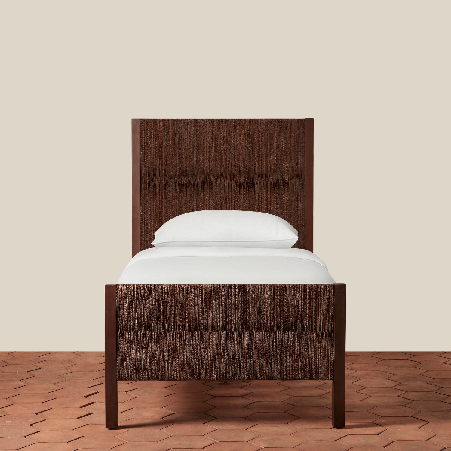 Wooden bed frame with white mattress and pillow on a beige background- Number 9