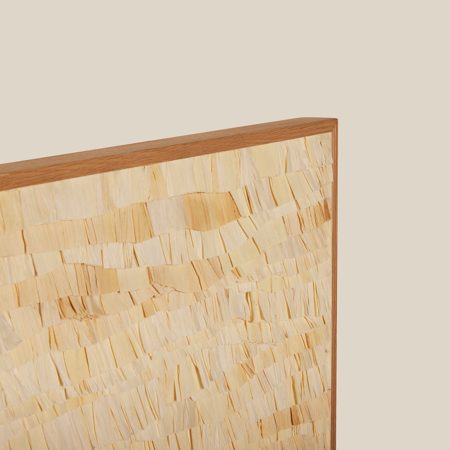 Wooden frame with a textured beige interior on a beige background- Number 11