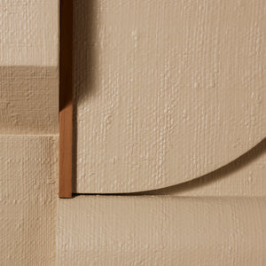 Close-up of textured beige wall art with a focus on the corner where two angles meet. - Number 9