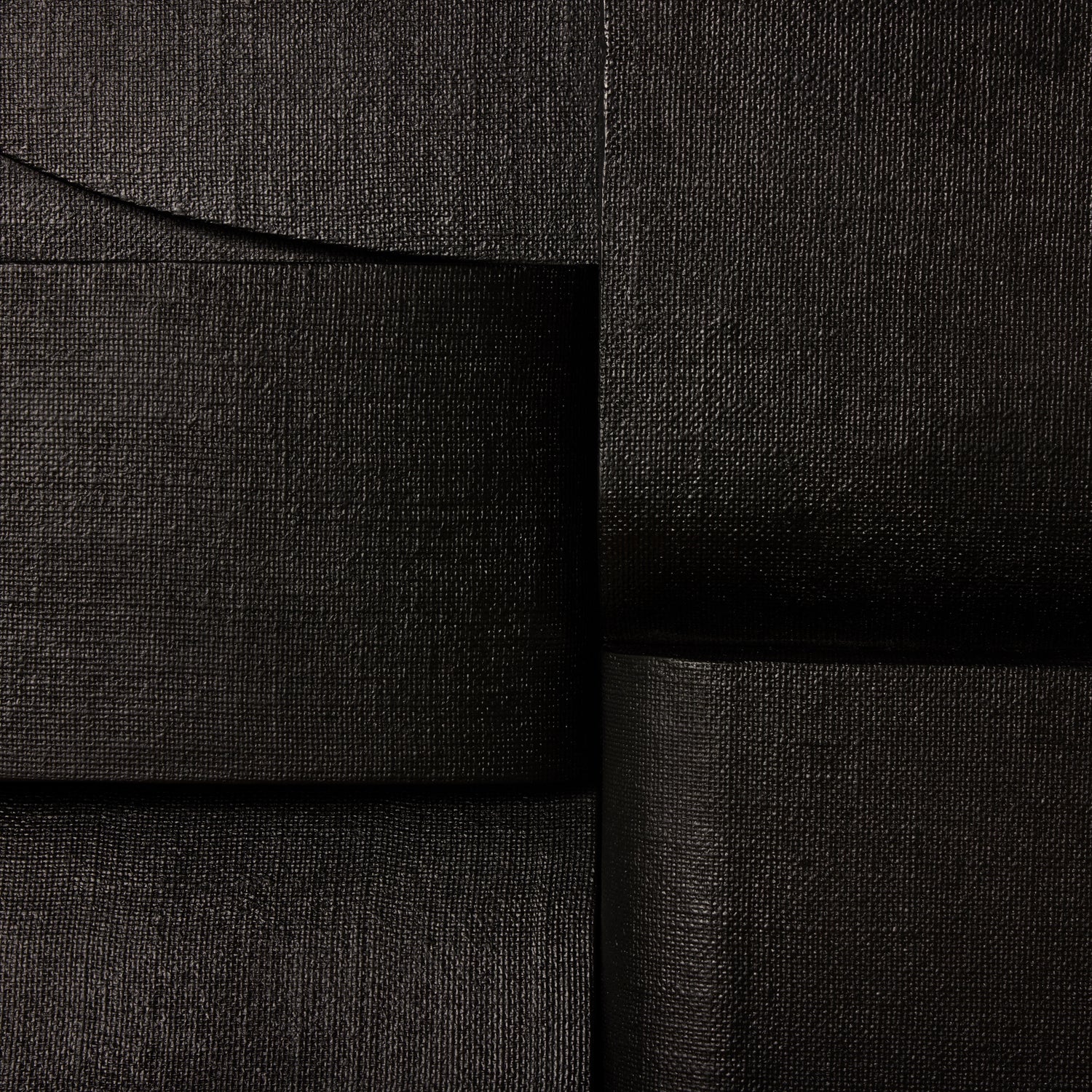 Close-up of black fabric with a subtle pattern- Number 5
