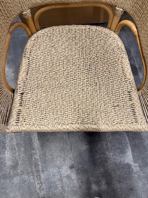 Wicker chair seat on a gray surface - Number 3