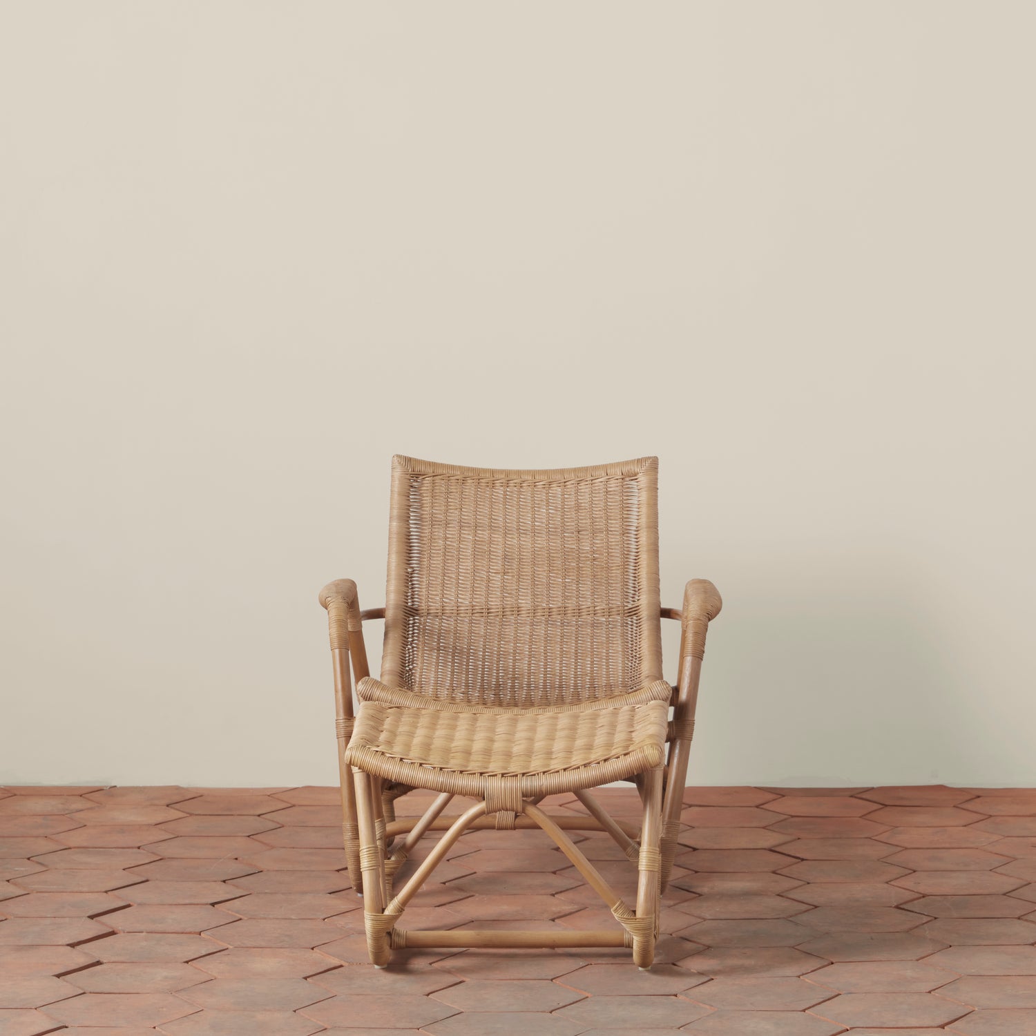 bodega wicker lounge chair and ottoman in natural front