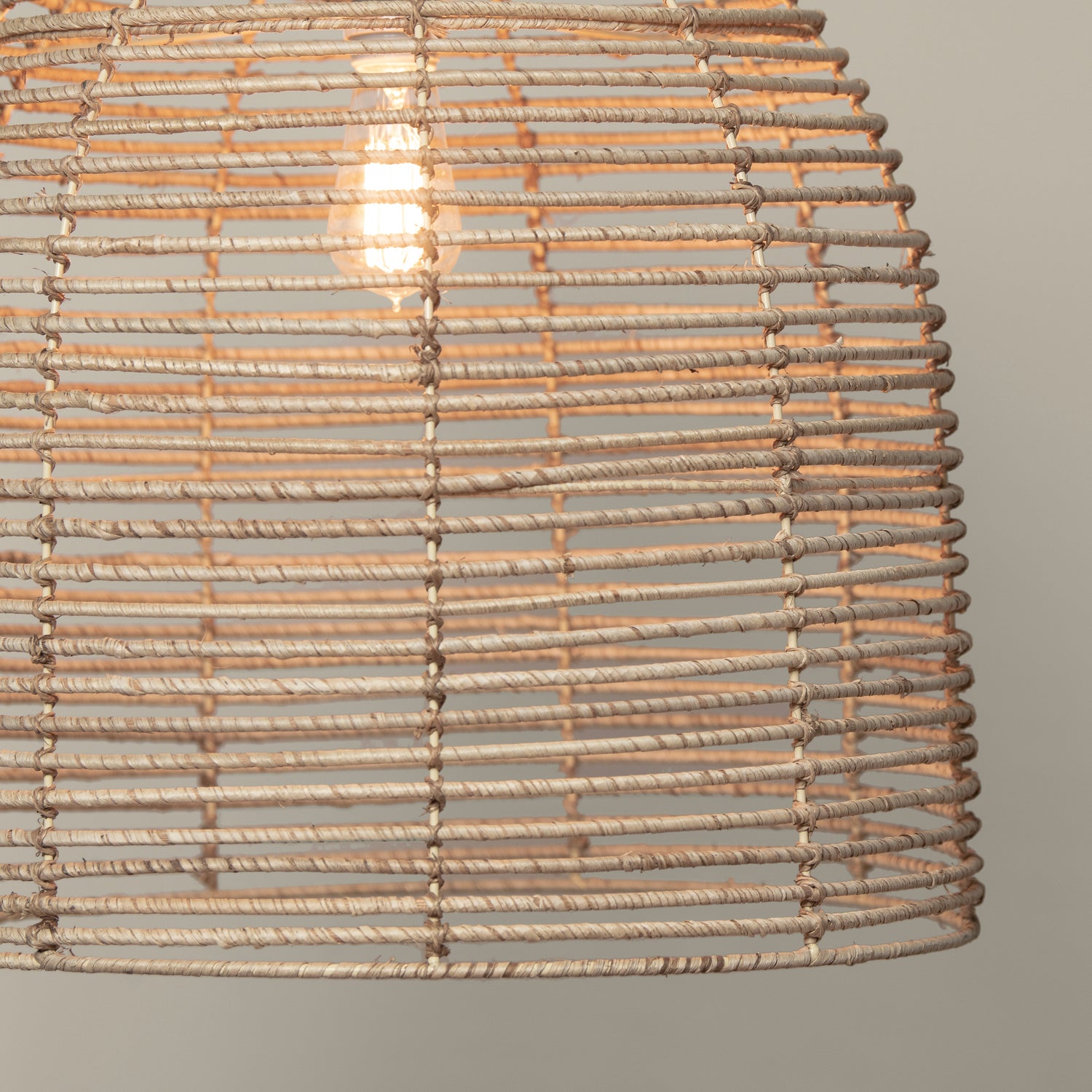 beehive chandelier detail with light on