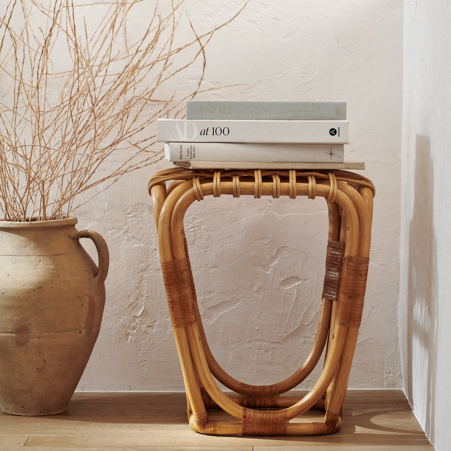 rattan studio stool styled with books- Number 2