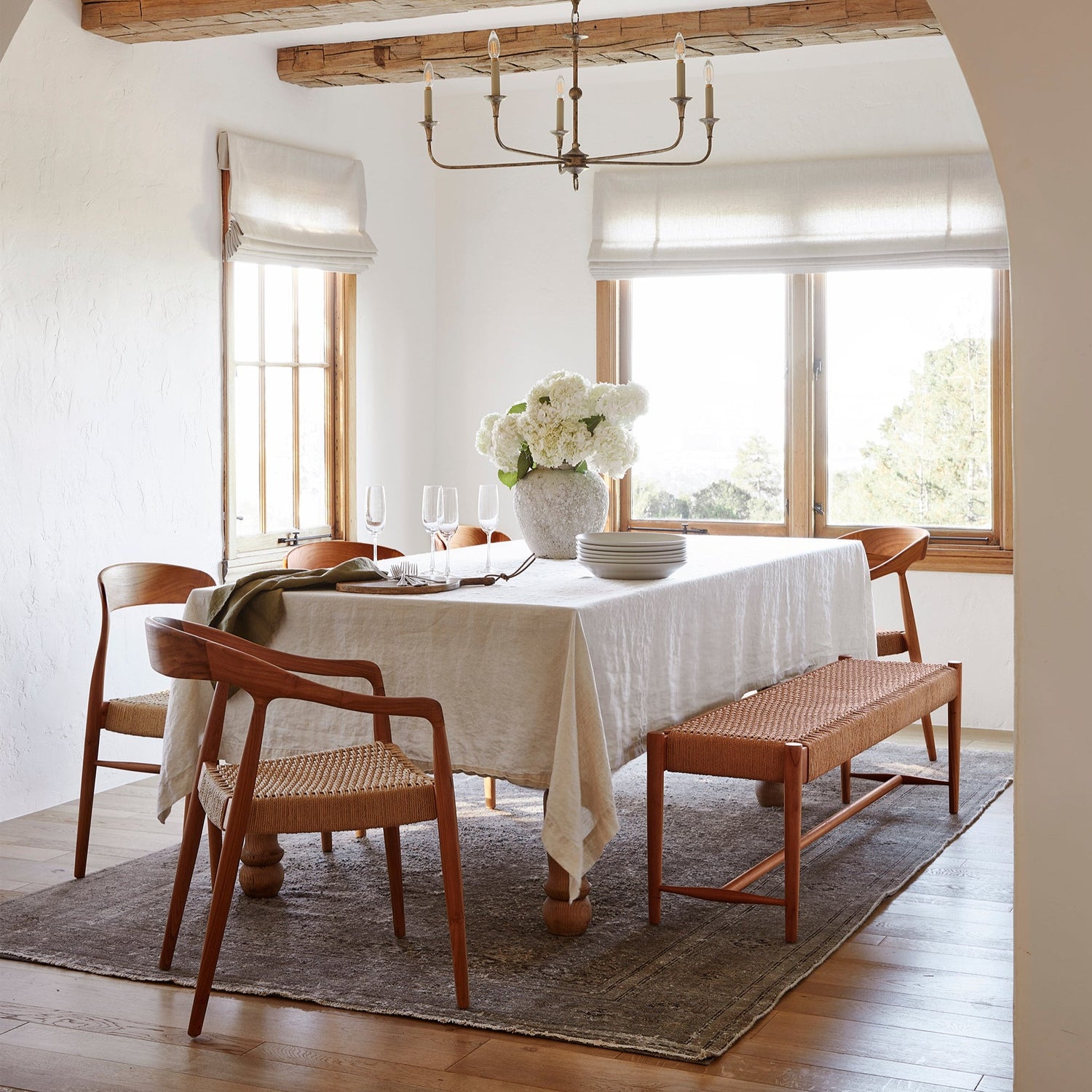 ingrid woven bench at dining table