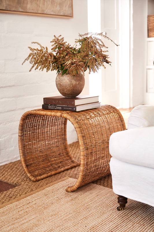 Healdsburg wicker side table in living room - Image 2