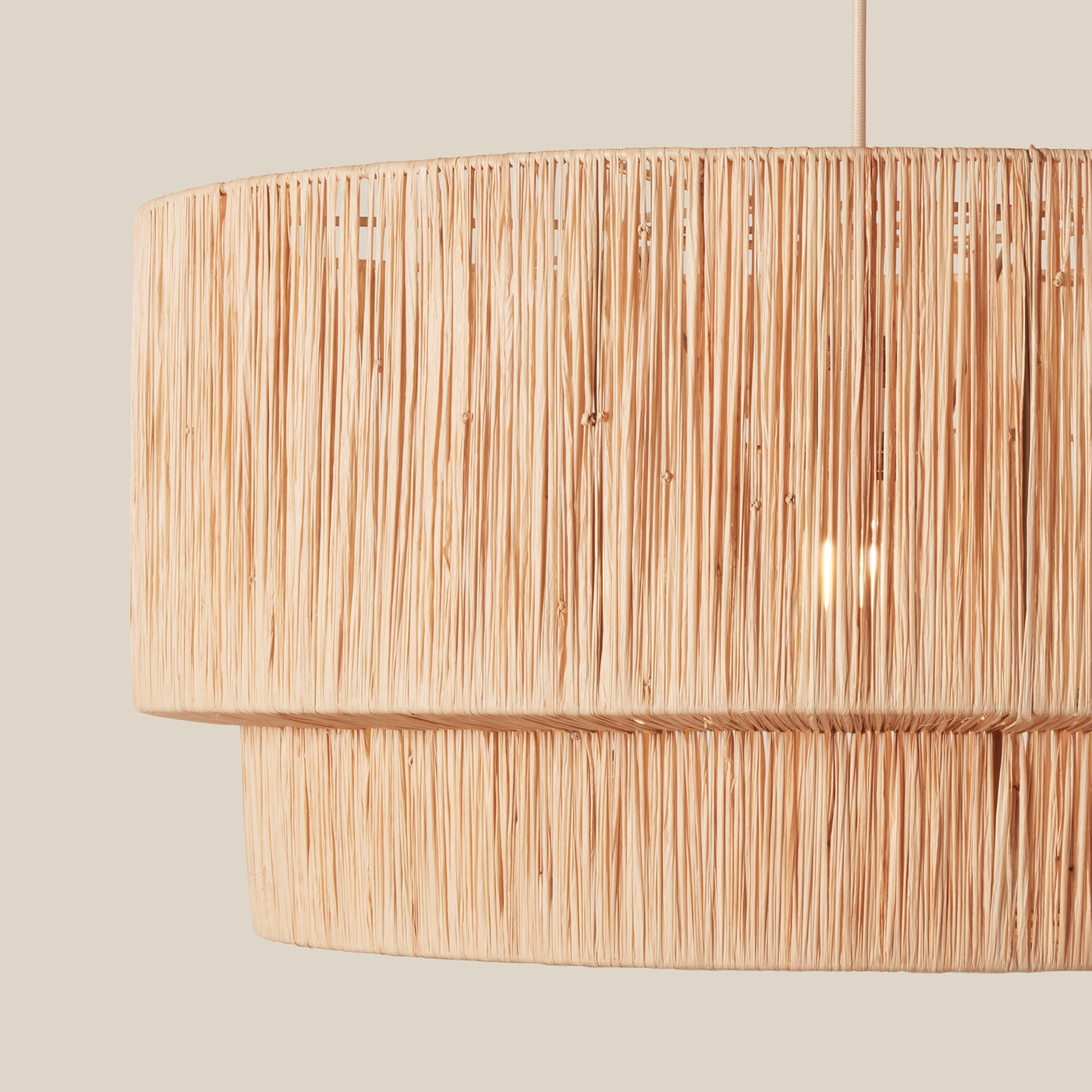 Woven pendant light with a natural finish on a beige background- Number 4