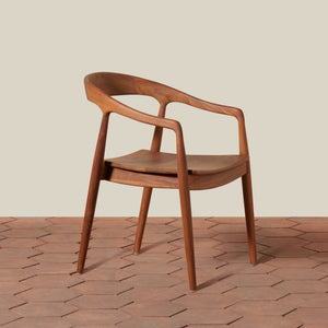 Wooden chair on a wooden floor with a beige background - Number 1