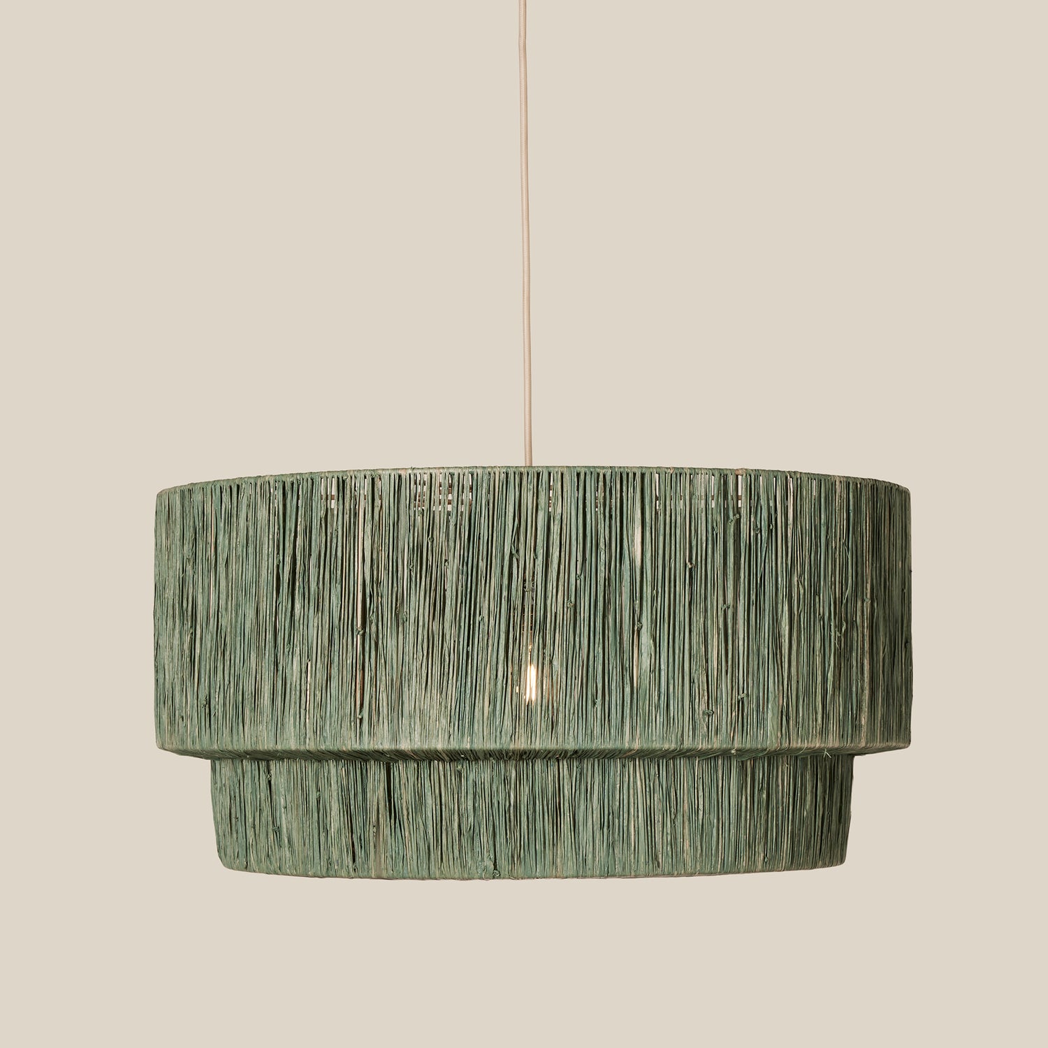 Green pendant lamp on a beige background- Number 8
