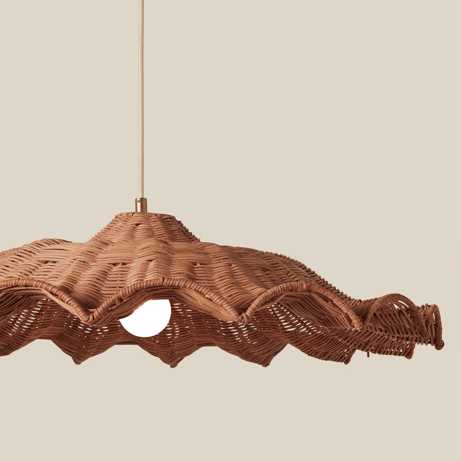 Woven rattan pendant light on a beige background- Number 5