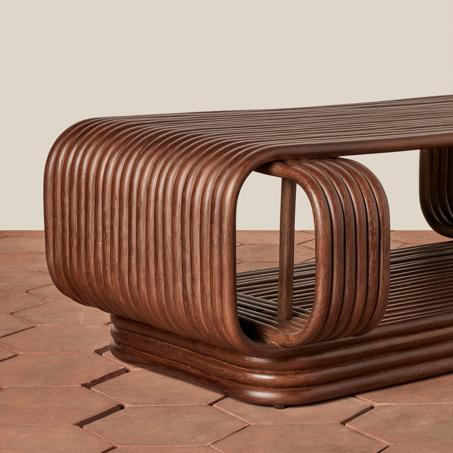 Wooden bench with curved design on a tiled floor- Number 3
