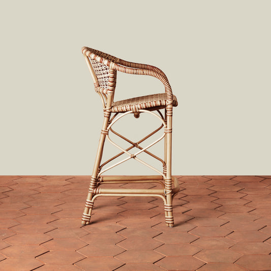 beige woven counter stool on tile floor with neutral background - Image 2