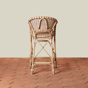 beige woven counter stool on tile floor with neutral background - Number 4