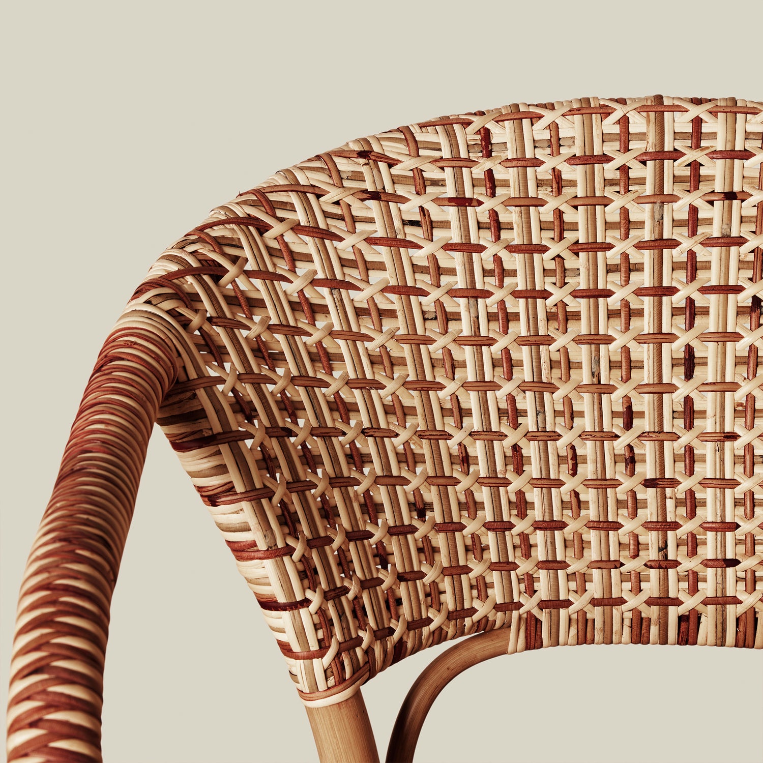 close up of woven chair back against neutral background- Number 5