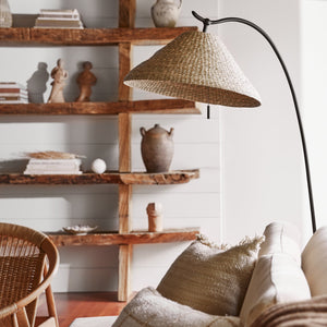floor lamp next to beige couch
