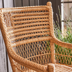 wicker chair outside with natural sunlight - Number 3