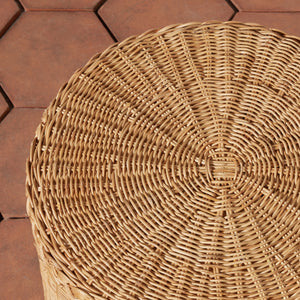 Close-up of a woven wicker stool on a wooden deck. - Number 4