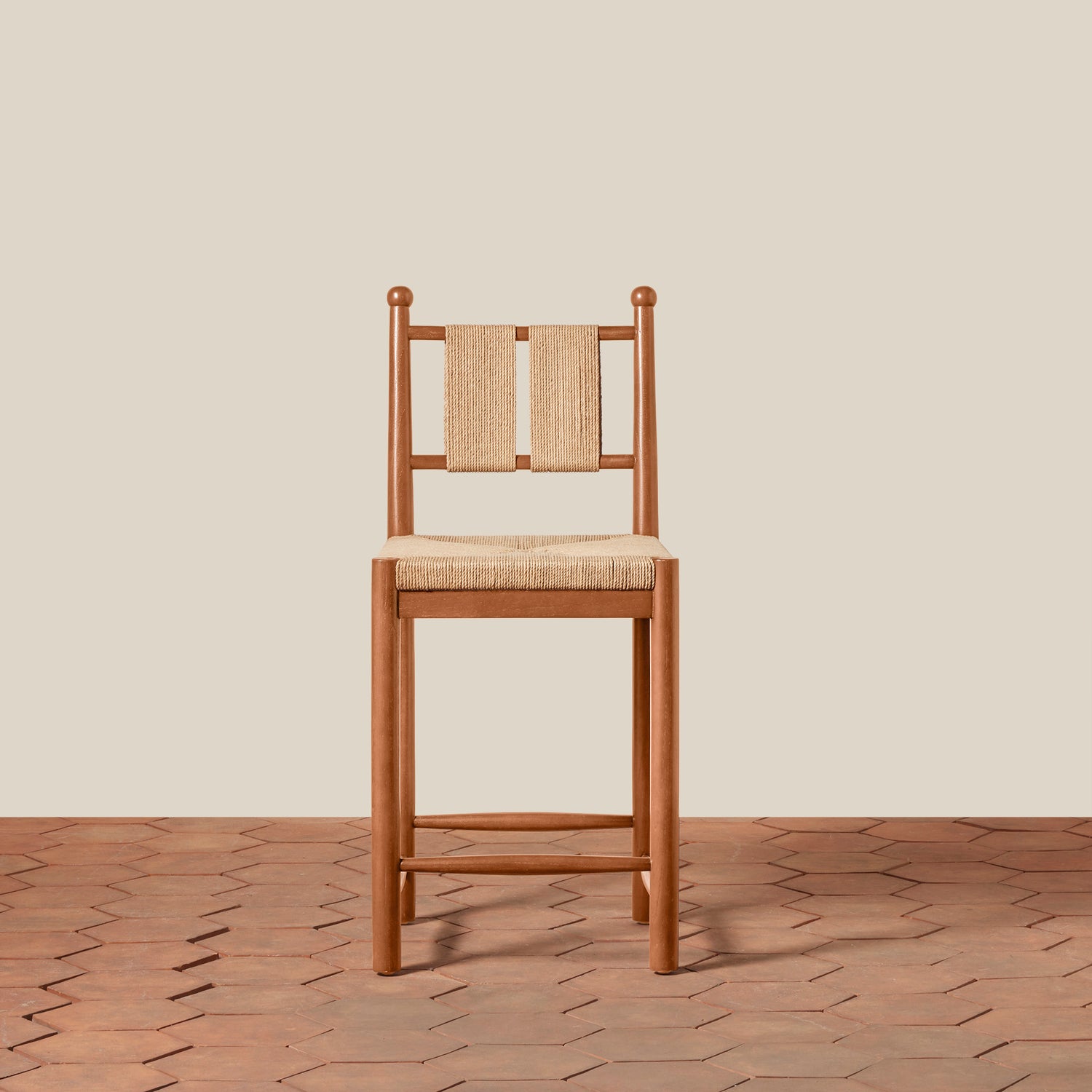 Wooden chair with woven backrest on a wooden floor and beige wall- Number 9