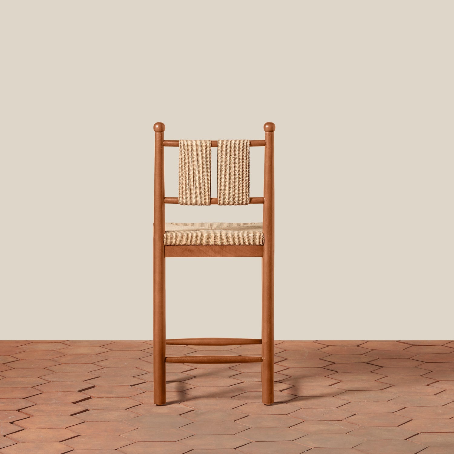Wooden chair with woven backrest on a wooden floor and beige wall- Number 10