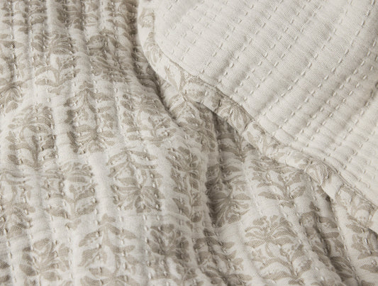 Close-up of textured beige fabric with a subtle pattern - Image 2