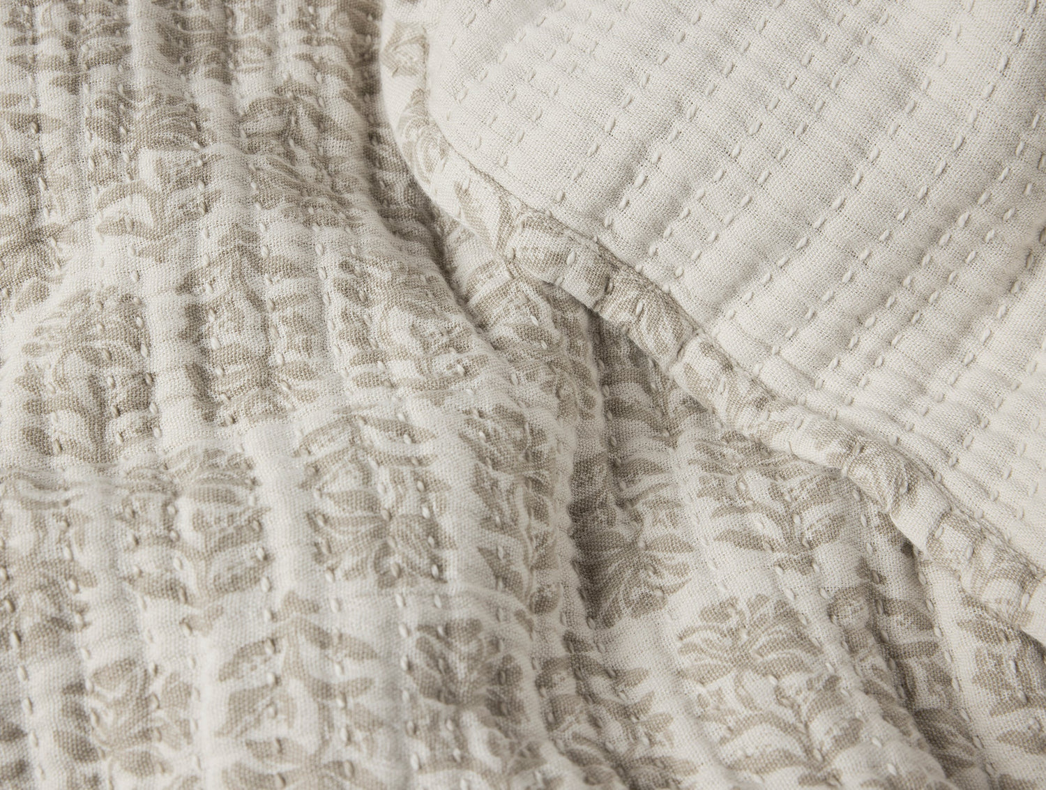 Close-up of textured beige fabric with a subtle pattern- Number 4
