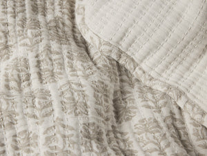 Close-up of textured beige fabric with a subtle pattern - Number 4