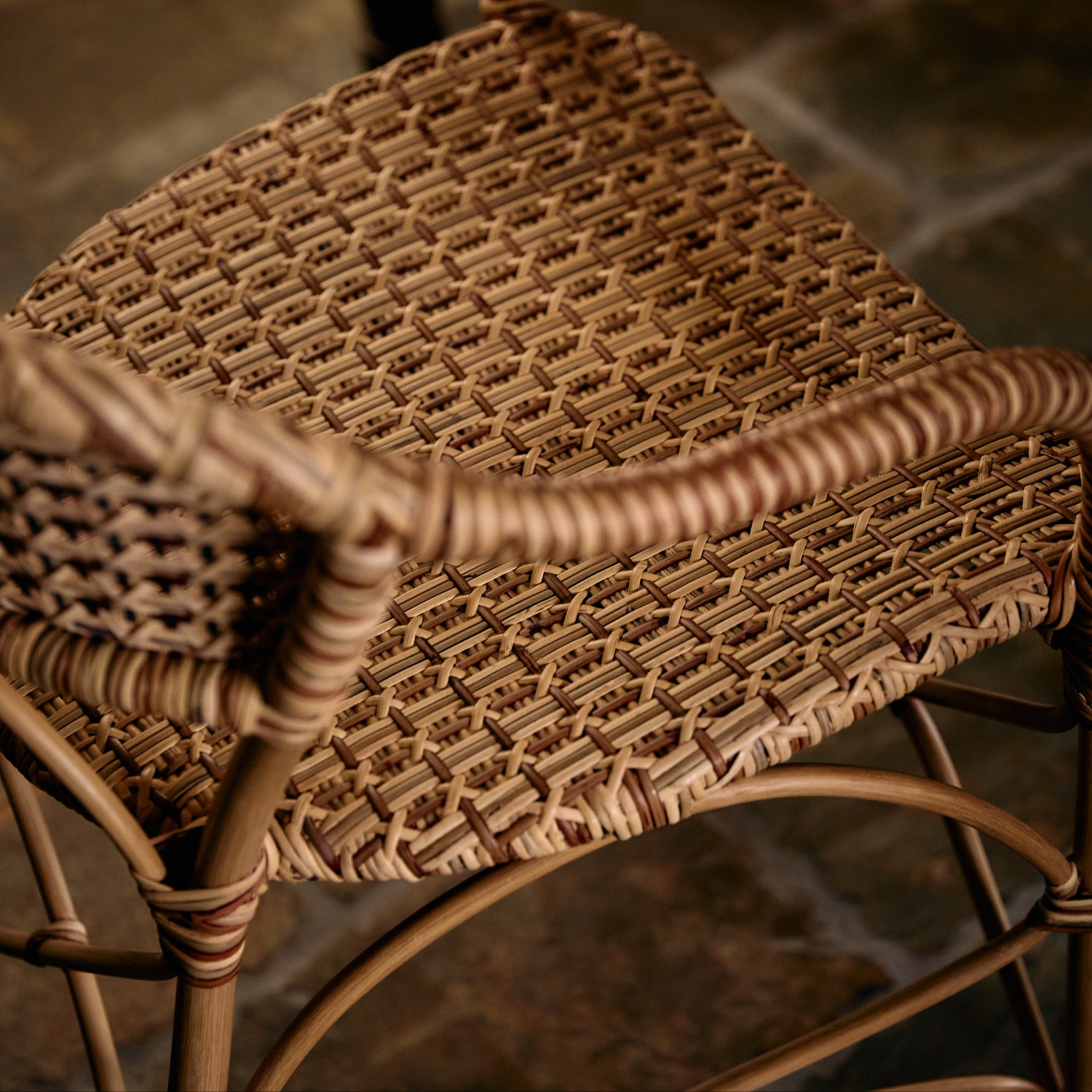 Close-up of a wicker chair seat with a blurred background- Number 5