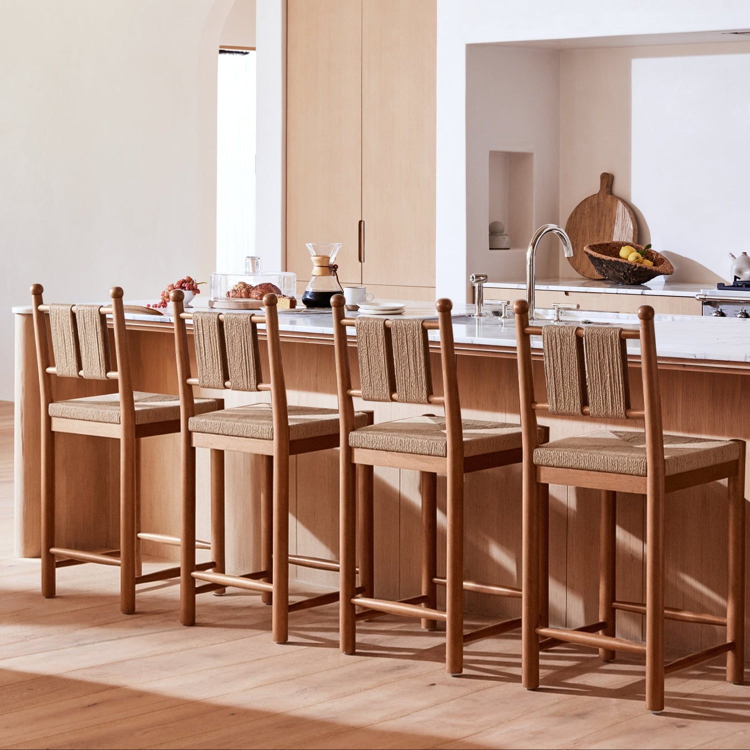 counter stools at kitchen island in white and brown kitchen- Number 8