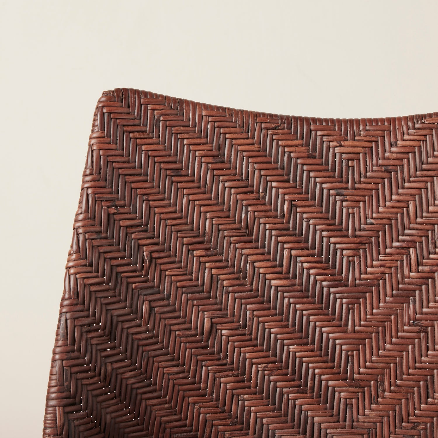 Close-up of a brown woven pattern on a beige background- Number 11