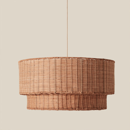 woven brown chandelier against neutral background