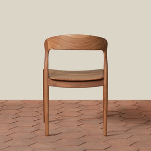 Wooden chair on a wooden floor with a neutral background - Number 4