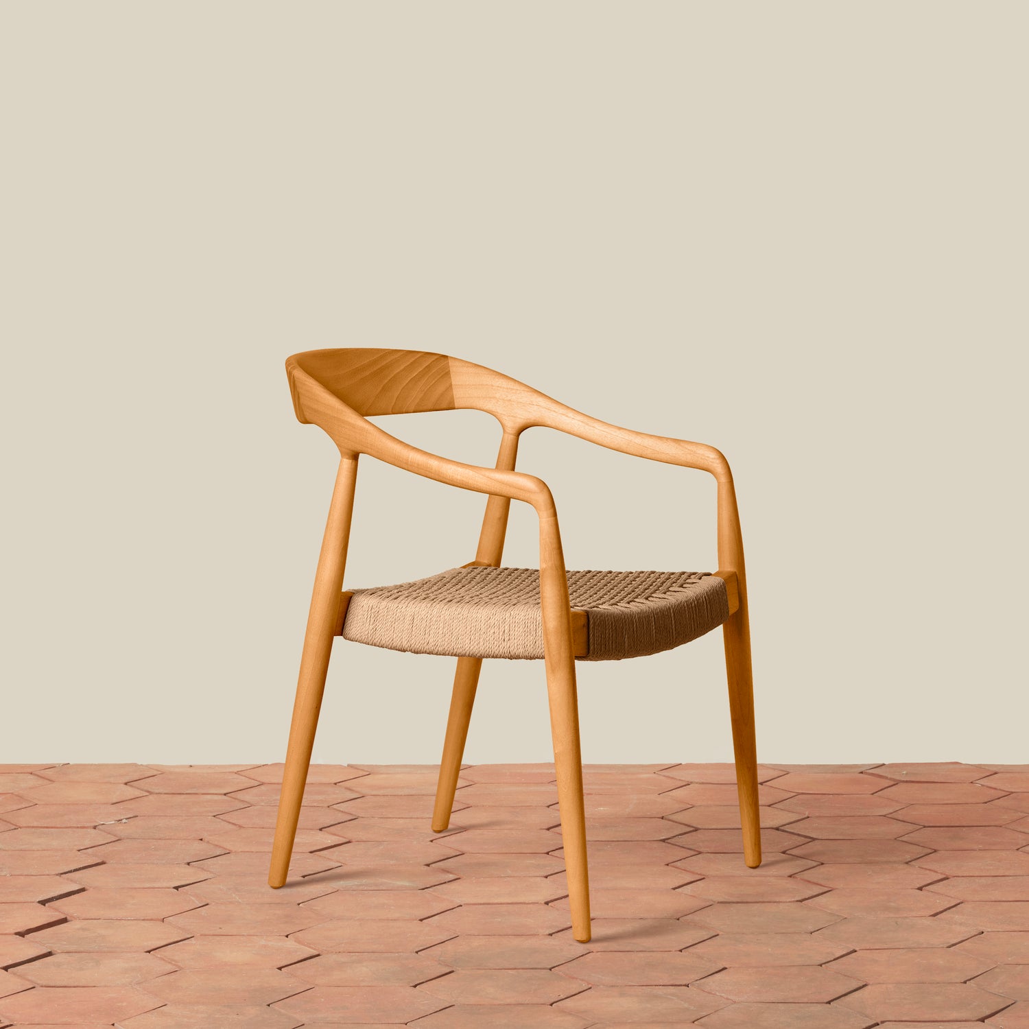 wooden arm chair on tile floor against gray background- Number 16