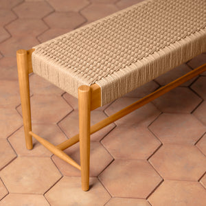 Woven bench with wooden frame on a hexagonal tile floor - Number 10