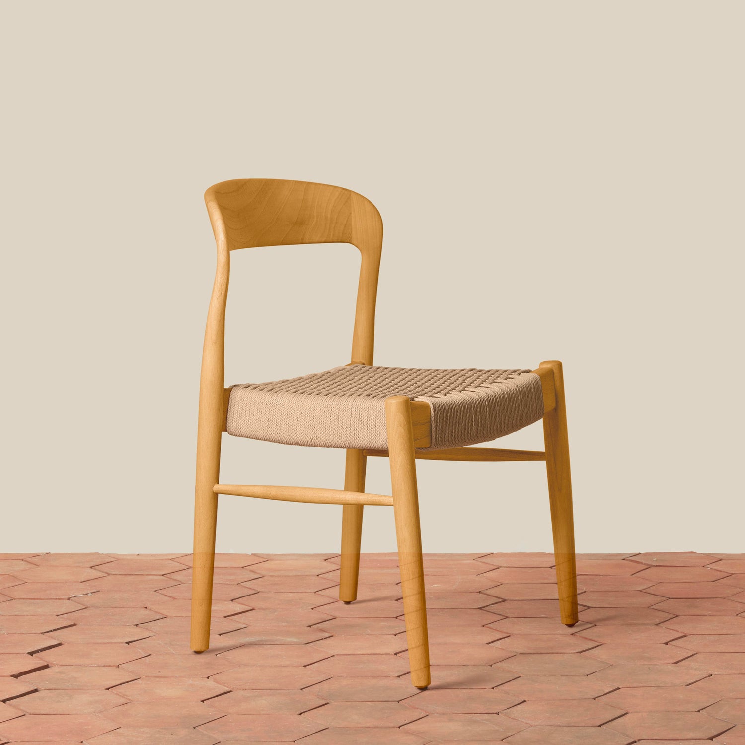 Wooden chair with woven seat on a wooden floor and beige wall background- Number 13