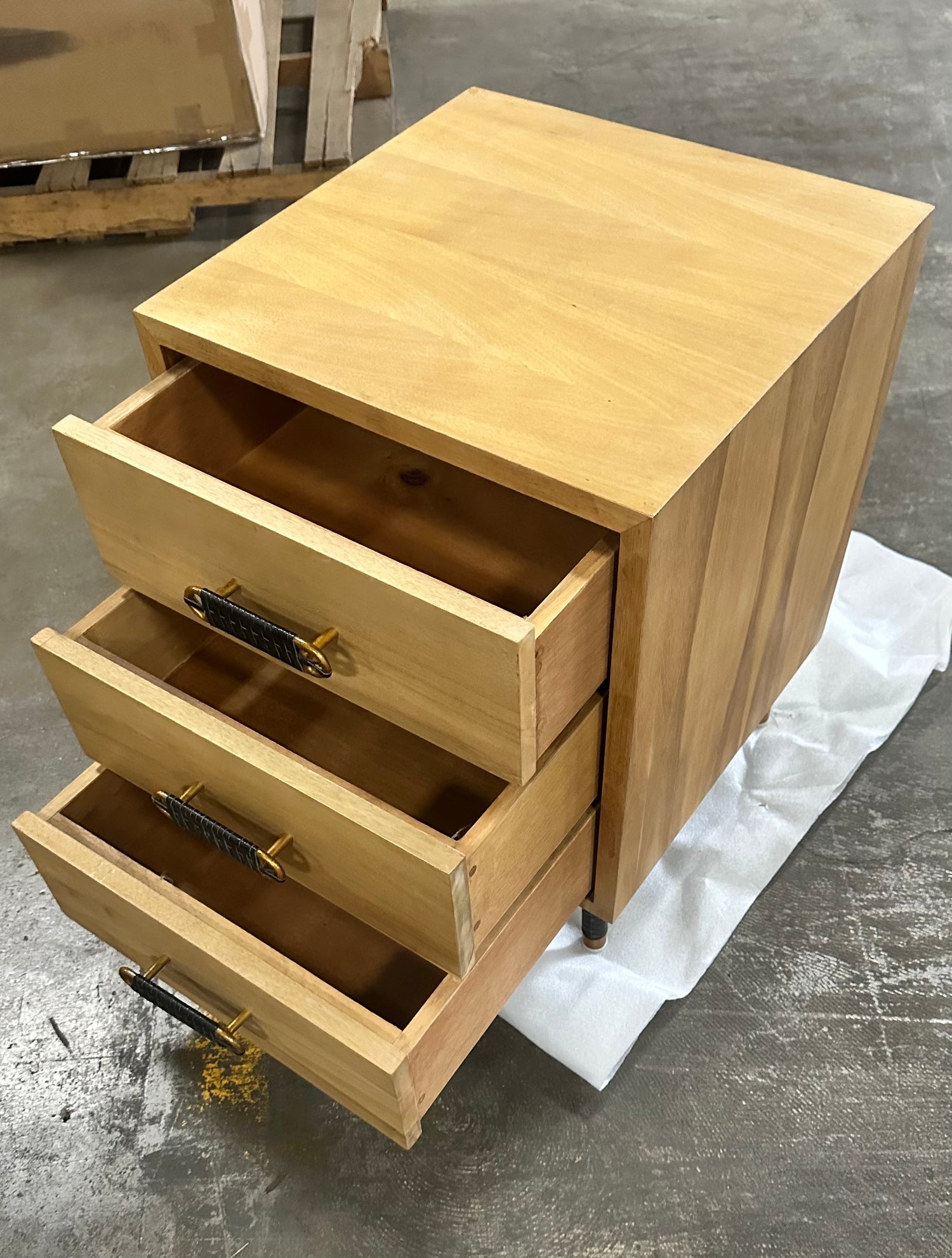 side table with opened drawers