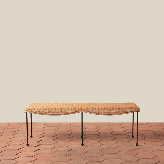 Woven bench on a wooden floor with a beige wall background - Image 2