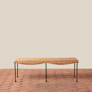 Woven bench on a wooden floor with a beige wall background - Number 2