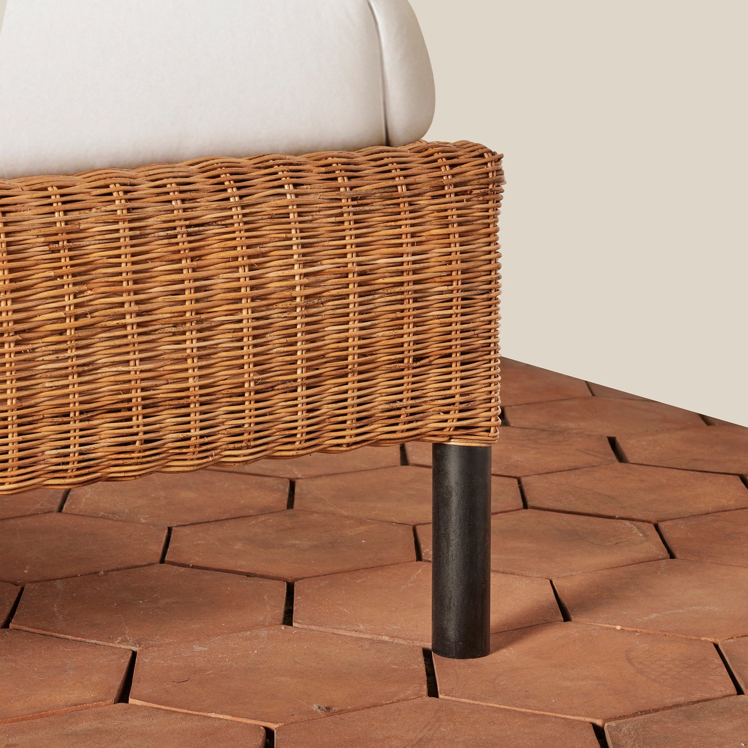 Wicker side table on a stone floor- Number 7