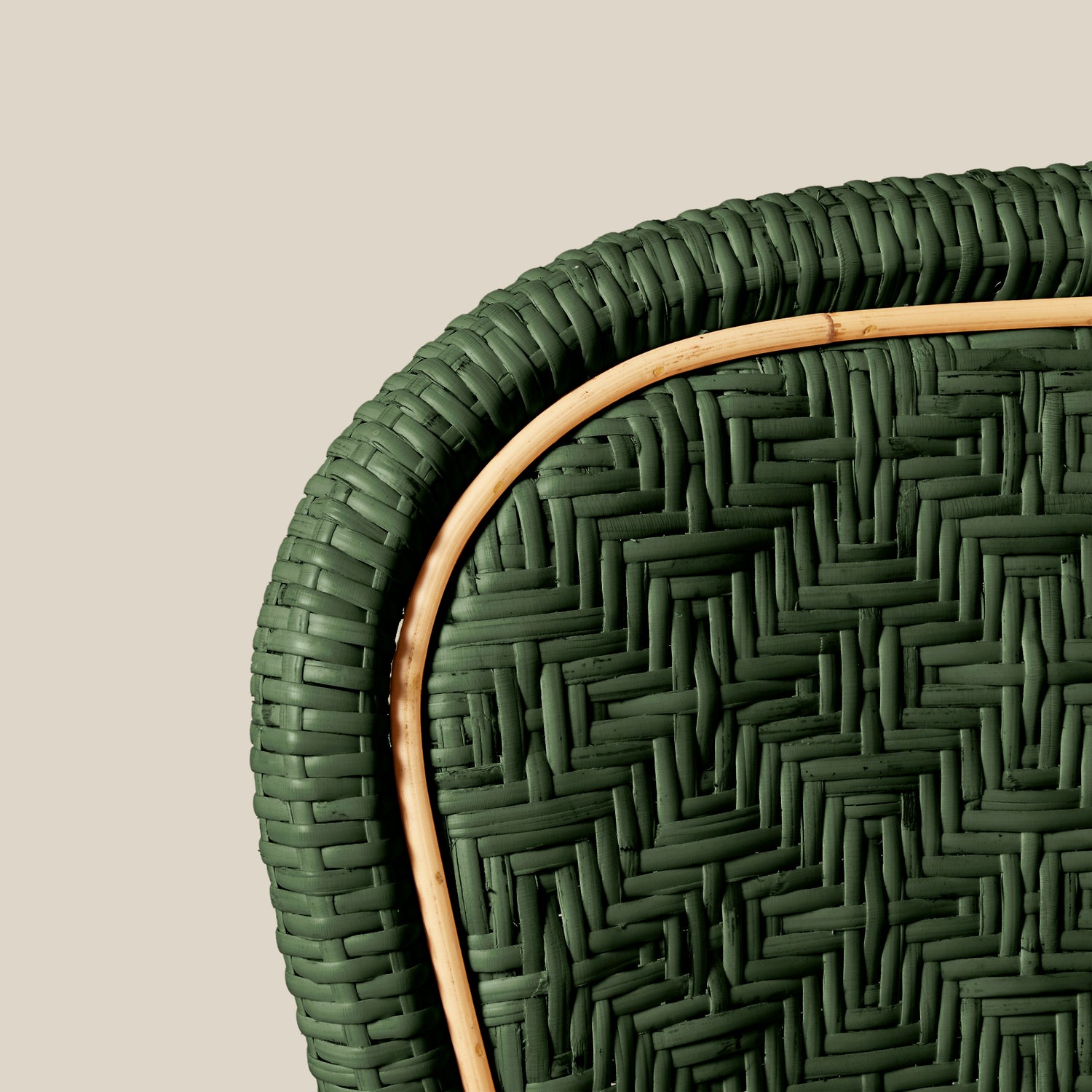 Close-up of a green woven tray with a beige background- Number 19
