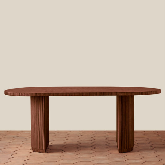 Wooden dining table on a beige background
