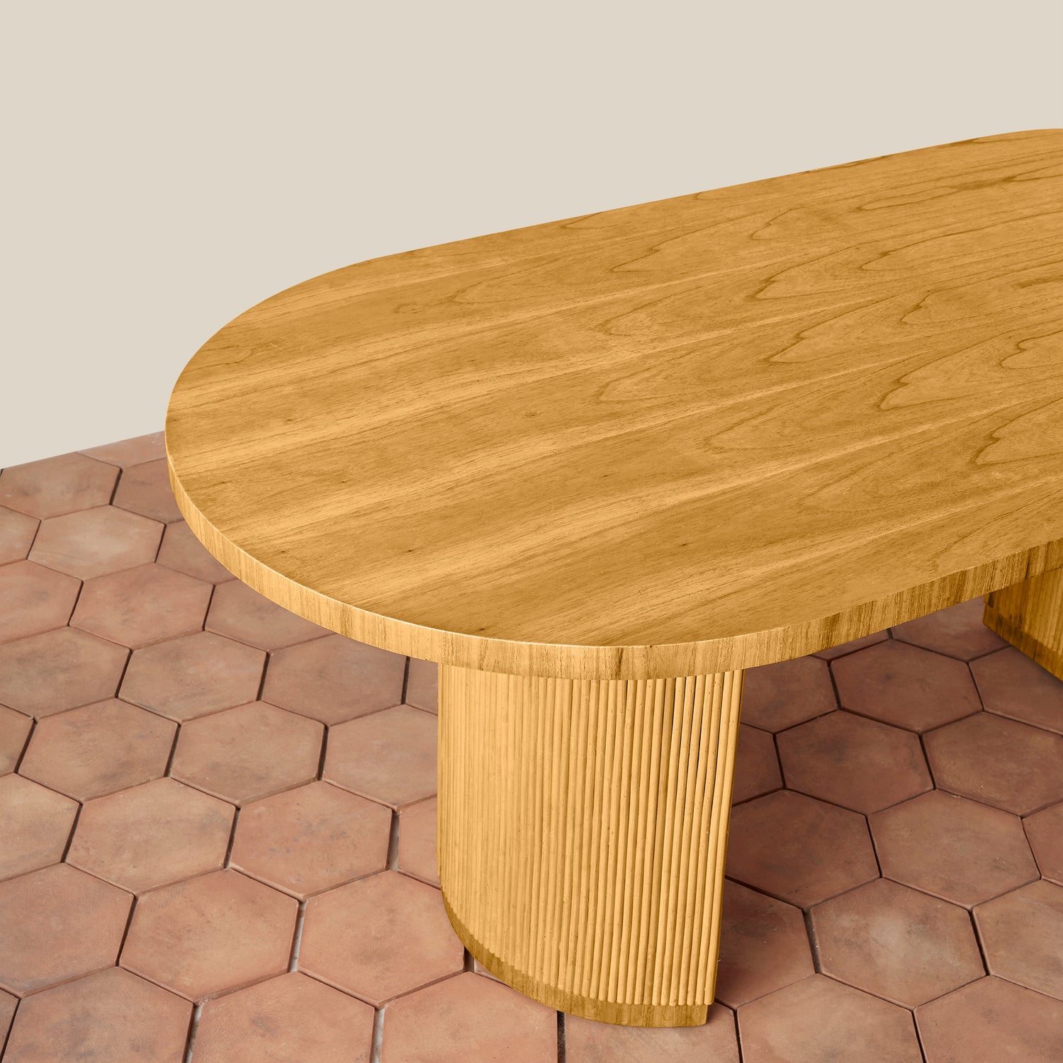 Wooden table with a textured base on a hexagonal tile floor- Number 4