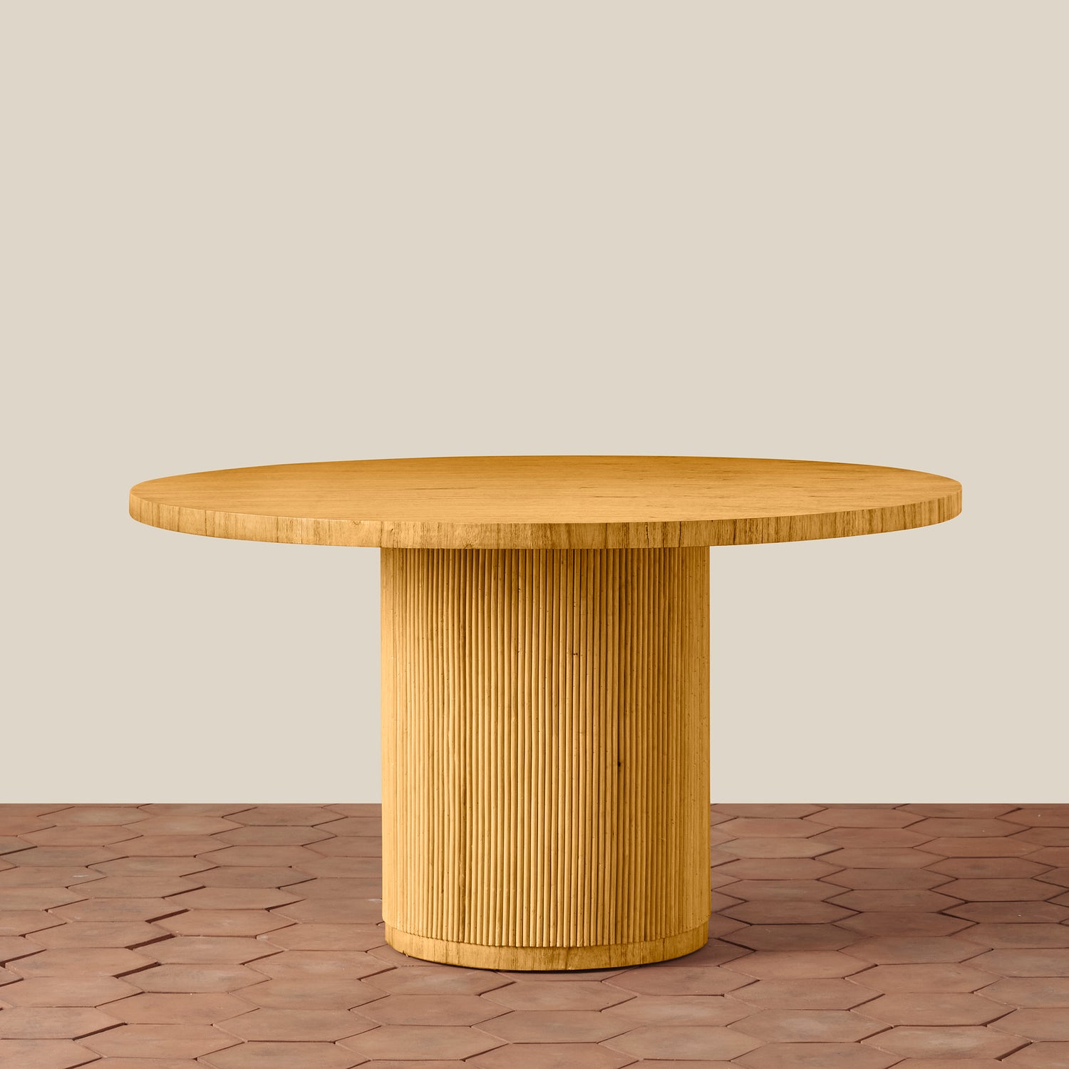 Wooden round table with a textured base on a wooden floor and beige wall background- Number 1